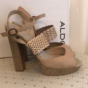 ALDO strappy, platform high heeled sandals.
